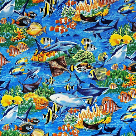Cherry Pit Crafts animal pattern fabric with sharks, rays, clownfish, and coral.