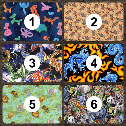 Cherry Pit Crafts microwaveable heating pad with animal patterns: balloon animals, dragons, jungle animals, and sock monkeys.