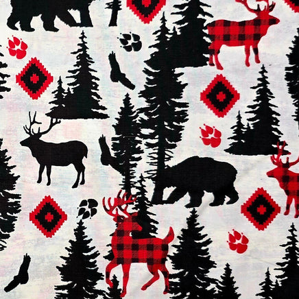 Cherry Pit Crafts microwaveable heating pad fabric with animal patterns: bears, deer, trees, paw prints, and red diamond shapes.