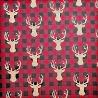 Cherry Pit Crafts microwaveable heating pad with deer pattern on red and black buffalo plaid fabric. 100% cotton.