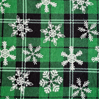 Cherry Pit Crafts green and black plaid flannel heating pad with white snowflakes. 100% cotton.