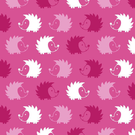 Cherry Pit Crafts microwaveable heating pad with cute hedgehog pattern in pink and white.