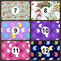 Cherry Pit Crafts microwaveable heating pad with animal pattern featuring hedgehogs in various colors on purple background.