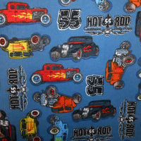Cherry Pit Crafts blue 100% cotton fabric with vintage hot rod cars, trains, and planes pattern.