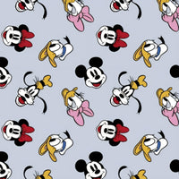 Cherry Pit Crafts microwaveable heating pad fabric with Mickey, Minnie, Donald, and Daisy Duck patterns on a light blue background.