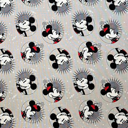 Cherry Pit Crafts grey cotton fabric with repeating pattern of Mickey and Minnie Mouse characters in circles.