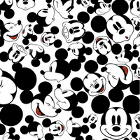 Cherry Pit Crafts Mickey Mouse pattern heating pad with black and white cartoon faces and polka dots on a white background.