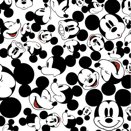 Cherry Pit Crafts Mickey Mouse pattern heating pad with black and white cartoon faces and polka dots on a white background.