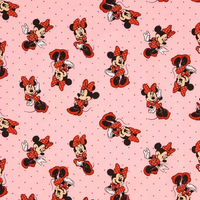 Cherry Pit Crafts pink heating pad with Minnie Mouse pattern and red polka dots. 100% cotton.