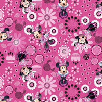 Cherry Pit Crafts pink heating pad with Minnie Mouse and floral pattern. 100% cotton.
