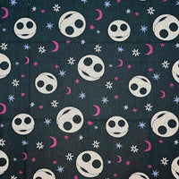 Cherry Pit Crafts Nightmare Before Christmas heating pad fabric with Jack Skellington faces, moons, and stars.