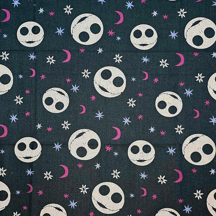 Cherry Pit Crafts Nightmare Before Christmas heating pad fabric with Jack Skellington faces, moons, and stars.