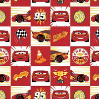 Cherry Pit Crafts Pixar themed heating pad with Lightning McQueen, checkered flags, traffic cones, and race car graphics on a red background.