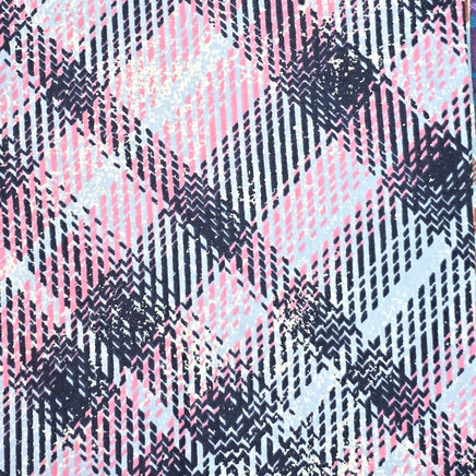 Cherry Pit Crafts microwaveable heating pad in a pink, blue, and navy plaid flannel pattern. 100% cotton.