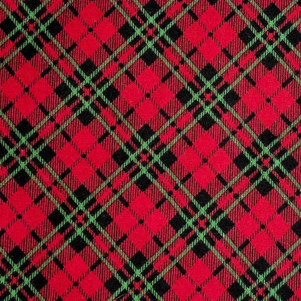 Cherry Pit Crafts red, black, and green plaid flannel heating pad. 100% cotton.