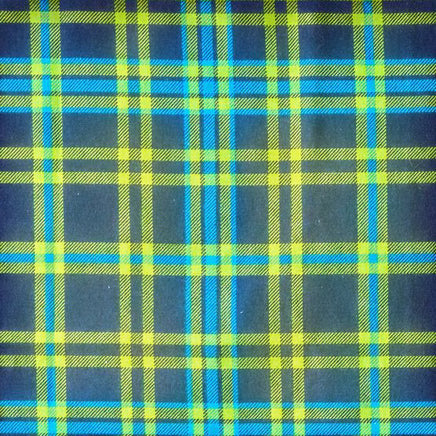 Cherry Pit Crafts plaid flannel heating pad in navy with lime green and bright blue plaid pattern.