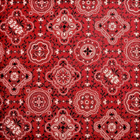 Cherry Pit Crafts red bandana print 100% cotton heating pad. Features intricate white and black paisley-inspired motifs.