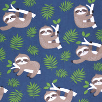 Cherry Pit Crafts blue heating pad with animal pattern featuring sloths on branches and green leaves.