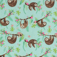 Cherry Pit Crafts microwaveable heating pad fabric with a sloth and baby sloth pattern on a light blue background.