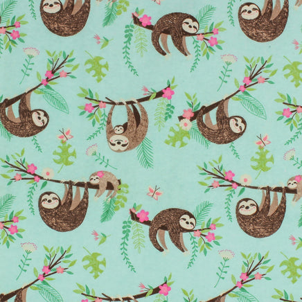 Cherry Pit Crafts microwaveable heating pad fabric with a sloth and baby sloth pattern on a light blue background.