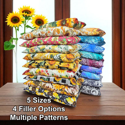 Cherry Pit Crafts microwaveable heating pads in sunflower patterns and multiple sizes. Cotton outer shell with cherry pit, rice, walnut, or flax seed filling.