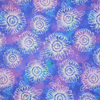 Cherry Pit Crafts microwaveable heating pad fabric with white outlined sunflowers on a purple and blue tie-dye background.