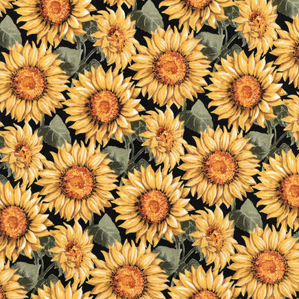 Cherry Pit Crafts microwaveable heating pad fabric with a sunflower pattern in yellow and green on a black background.
