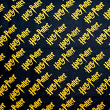 Pattern of 'Harry Potter' logo repeated on a dark background