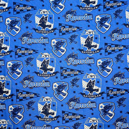 Pattern of Ravenclaw logos and text on a blue background